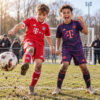 Bayern Munich Home and Third Gift Pack Kids Football Kits 26/27 - boys wearing kids football kits on UK pitch